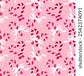 Seamless pattern with Christmas candy canes and bows on pink background. Romantic background design for fabric, wrapping paper, textile, wallpaper