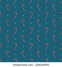 Seamless pattern of Christmas candy caramel white red with white dots on a dark aquamarine background.