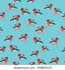 Seamless pattern for Christmas with cane lollipop and bullfinch bird. Winter holiday, cooking, new year's eve.