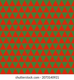 Seamless pattern with Christmas decoration. Green and red triangles pattern.