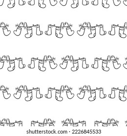 Seamless pattern with Christmas decoration with socks hand drawn doodle outline vector