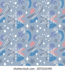 Seamless pattern with Christmas details in a hand drawn linear style. Wrapping holiday paper. Modern continuous line art vector illustration and abstract. Snowflake, a candy and an ornament.