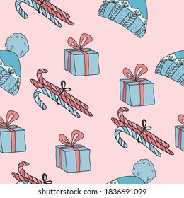 Seamless pattern with Christmas elements for the background. Vector Christmas, cozy, cute elements: hat, gift, caramel.