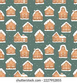 Seamless pattern of christmas gingerbread house cookies with snow on green background