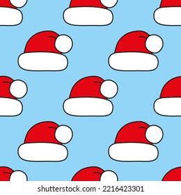 Patrón sin foco con sombreros de Navidad en azul. Capa roja de Santa. Fondo para diseños festivos, impresiones textiles, envolturas, decoraciones de papel, decoraciones, banners, tarjetas e invitaciones.
