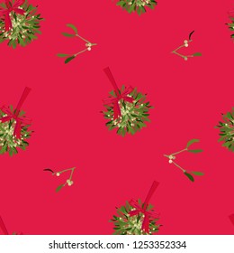 Seamless pattern of Christmas mistletoe bushes on a red background