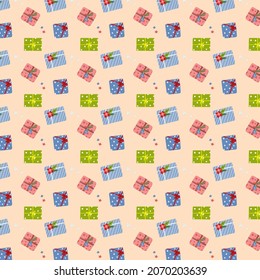 Seamless pattern with Christmas presents box on a beige background. Vector illustration.