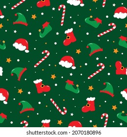 Seamless pattern for Christmas, Santa hat, and boots, Elf hat and shoes, candy cane on green backgound. Good for wrapping paper, textile print, cover,label, and other gifts design.