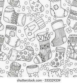 Seamless pattern with christmas socks. Artistically winter, christmas, zentangle patterns. Vector.  Hand-drawn design element. Pattern for coloring book. Made by trace from sketch.