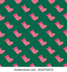 Seamless pattern with christmas socks. Merry Christmas and Happy New Year print design.