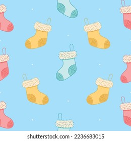 Seamless pattern with christmas socks on red background Editable Free Vector Image
