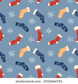 Seamless pattern with Christmas socks and snowflakes. Various winter colorful socks with different patterns. Cotton and wool accessories. Vector flat pattern.