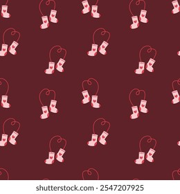 Seamless pattern with Christmas socks. Various winter socks with different patterns, isolated on a burgundy background