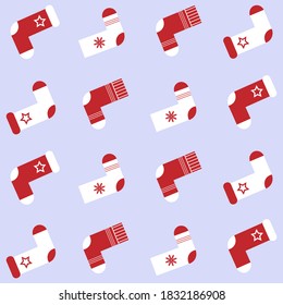 Seamless pattern with christmas socks. Vector illustration.
