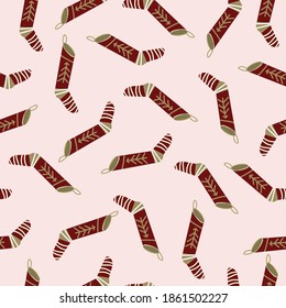 Seamless pattern with christmas socks. Vector illustration for Merry Christmas and Happy New Year print design.