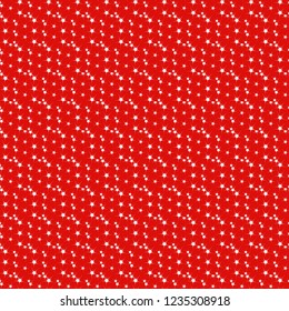 Seamless pattern. Christmas stars on a red background