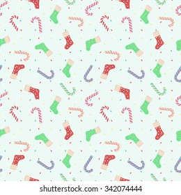 Seamless pattern of Christmas sweet candies and gift socks