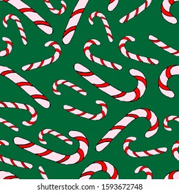 Seamless pattern. Christmas sweets on a green background. Lollipop. Vector. Doodle style. Can be used for decoration of cards, invitations. Designer t-shirts, mugs, gifts. Fabric, covers, wrapping pap