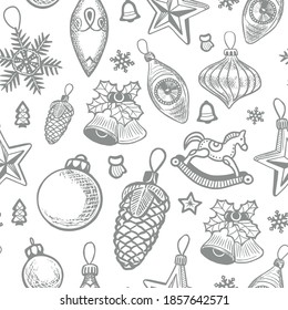 Seamless pattern with Christmas toys and hand drawn engraved Xmas elements