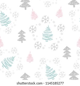 Seamless pattern with Christmas trees and snowflakes