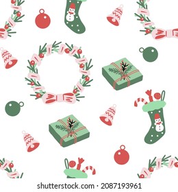 Seamless pattern with Christmas wreath, boot, toys and gifts. Christmas repeating texture for surface design, wallpapers, fabrics, wrapping paper etc.