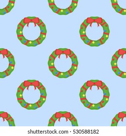 Seamless pattern with Christmas wreath on blue background. Vector texture.