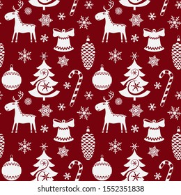 Seamless pattern with Christmas-tree decorations, bells, candy canes, snowflakes and silhouette reindeer.