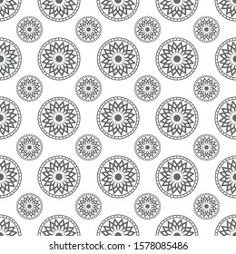 Seamless pattern of circle ornament in the white backdrop