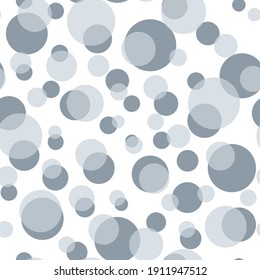 Seamless pattern. Circles of different sizes isolated on white background. Shades of gray. Vector illustration. 