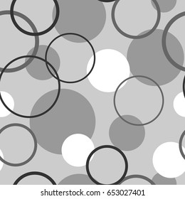Seamless pattern with circles in monochrome grey colors. Abstract geometric modern vector background.
