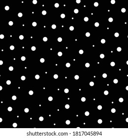 Seamless pattern. Circles of ornament. Wallpaper with dots. Polka dot motif. Geometric background. Vector image.