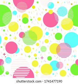 Seamless pattern with circles. Pink, green, yellow, blue circles. The Memphis style. White background. Geometrical figure. Seamless vector illustration with geometric shapes. Printing on fabrics.
