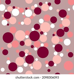 Seamless pattern with circles in pink, white and burgundy colors. Background in a minimalistic style. Print option for fabric, wrapping, packaging. Vector illustration.