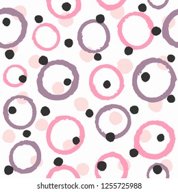 Seamless pattern with circles and round dots painted with rough brush. Grunge, watercolor, sketch. Abstract stylish print. Vector illustration. White, pink, purple, black.
