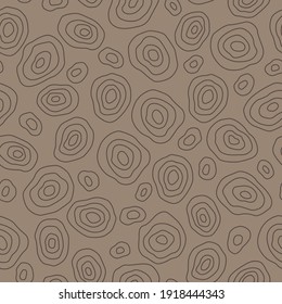 Seamless pattern with circles, vector illustration. Abstract drawing on a brown background in the style of minimalism. For wrapping paper, wallpaper, fabric, banners, etc.
