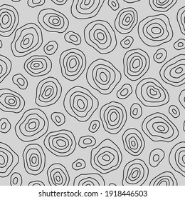 Seamless pattern with circles, vector illustration. Abstract drawing on a gray background. For wrapping paper, wallpaper, fabric, banners, etc.
