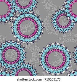 Seamless pattern with circular floral ornaments. Floral background with mandalas for the greeting cards, invitation, business style, cards, textile backgrounds or else. Vector illustration.