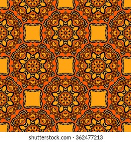 Seamless pattern of circular symmetrical mandalas on yellow background. Ethnic round ornament. Vector background. 