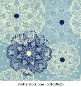 Seamless pattern with circular tangled ornaments like a snowflakes. Can be used as a background for greeting cards,  invitation, business style, print on clothes or else. Vector drawing in blue colors