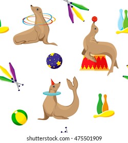 Seamless pattern with circus seals and items