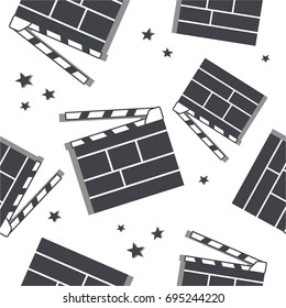 Seamless pattern with clapperboards and stars, hand drawn icons. Black and white overlapping backdrop vector. Movie icon, star, cinema sign. Decorative wallpaper, good for printing