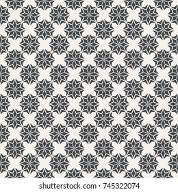 Seamless pattern. Classical stylish geometric texture. Regularly repeating geometrical ornament with rhombuses, stylized flowers, crosses. Vector element of graphic design