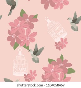 A seamless pattern with clematis flowers, birds and a cage on a pink background. For decorating textiles, packaging and wallpaper. Vector illustration.