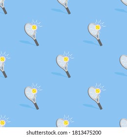 Seamless pattern with clipping mask. Tennis racket with a ball in the rays and with a shadow in a staggered on a blue background. EPS10