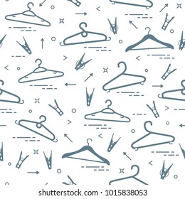 Seamless pattern with clothes hangers and clothespins. Design for banner and print.
