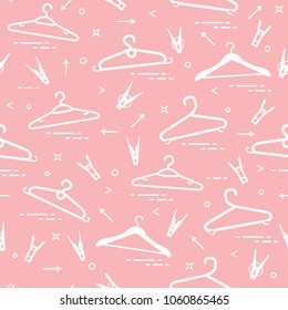 Seamless pattern with clothes hangers and clothespins. Design for banner and print.