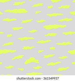 Seamless pattern with clouds of bright yellow green to a light gray background.