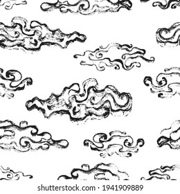 Seamless pattern of clouds hand-drawn ink.