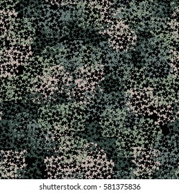 Seamless pattern. Clouts with stars. Random order. Spotted chaos. Fashion camouflage.  Grunge image.