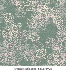 Seamless pattern. Clouts with stars. Random order. Spotted chaos. Fashion camouflage.  Grunge image.